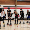 Raw Meat Roller Skaters learn roller derby drills