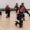 skaters stretch in their roller skates